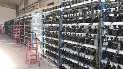 A mining farm utilizing solar panels for energy, illustrating a shift towards sustainable power sources.