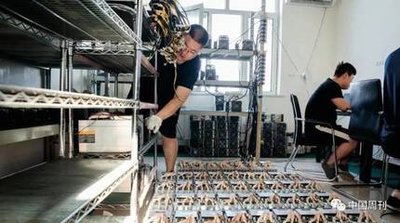 A close-up of an ASIC mining rig, highlighting its intricate circuitry and cooling fans