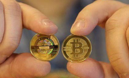 Bitcoin coins on a circuit board